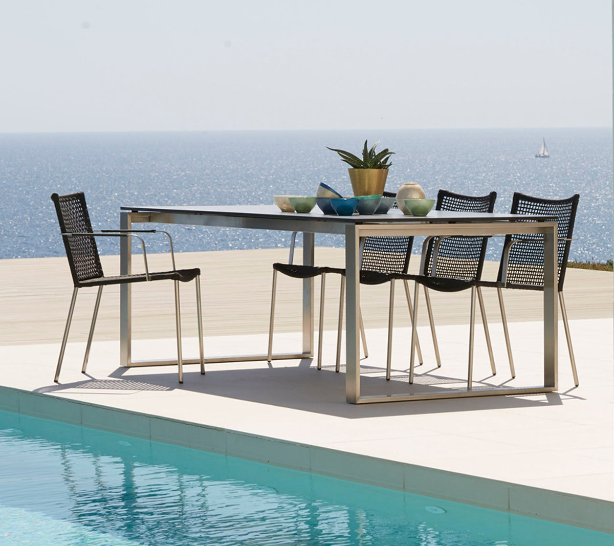 Straw armchair dining chair by Cane-line, designed by Foersom & Hiort-Lorenzen MDD
