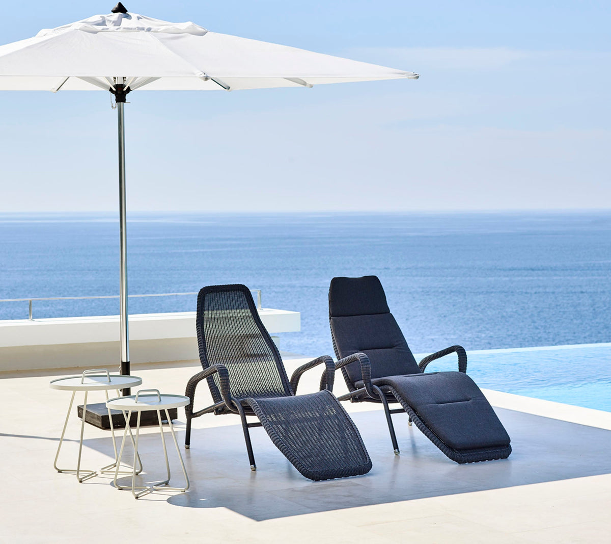 Sunrise sunchair in a modern outdoor setting by Cane-line
