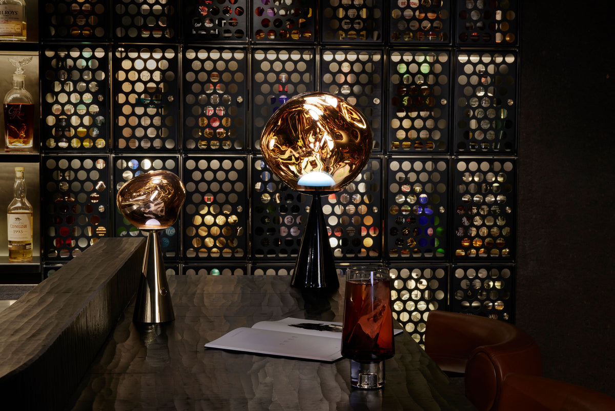 Tom Dixon Melt Fat Cone Table Light in gold, angled view