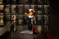 Tom Dixon Melt Fat Cone Table Light in gold, angled view