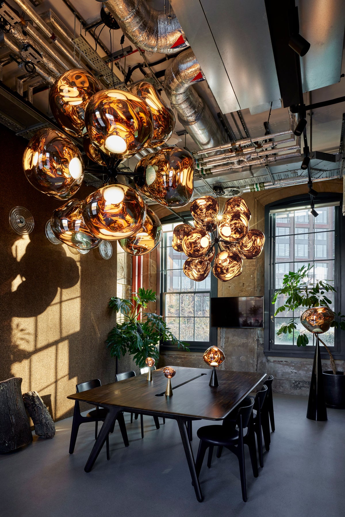 Tom Dixon Melt Burst Chandelier in an official lifestyle setting