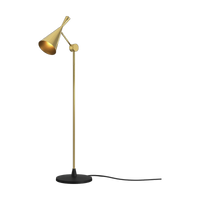 Beat Floor Light in Polished Brass by Tom Dixon