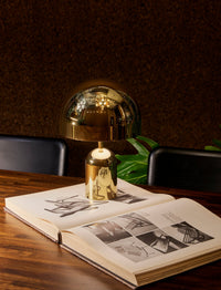 Bell Portable Light in Polished Gold by Tom Dixon