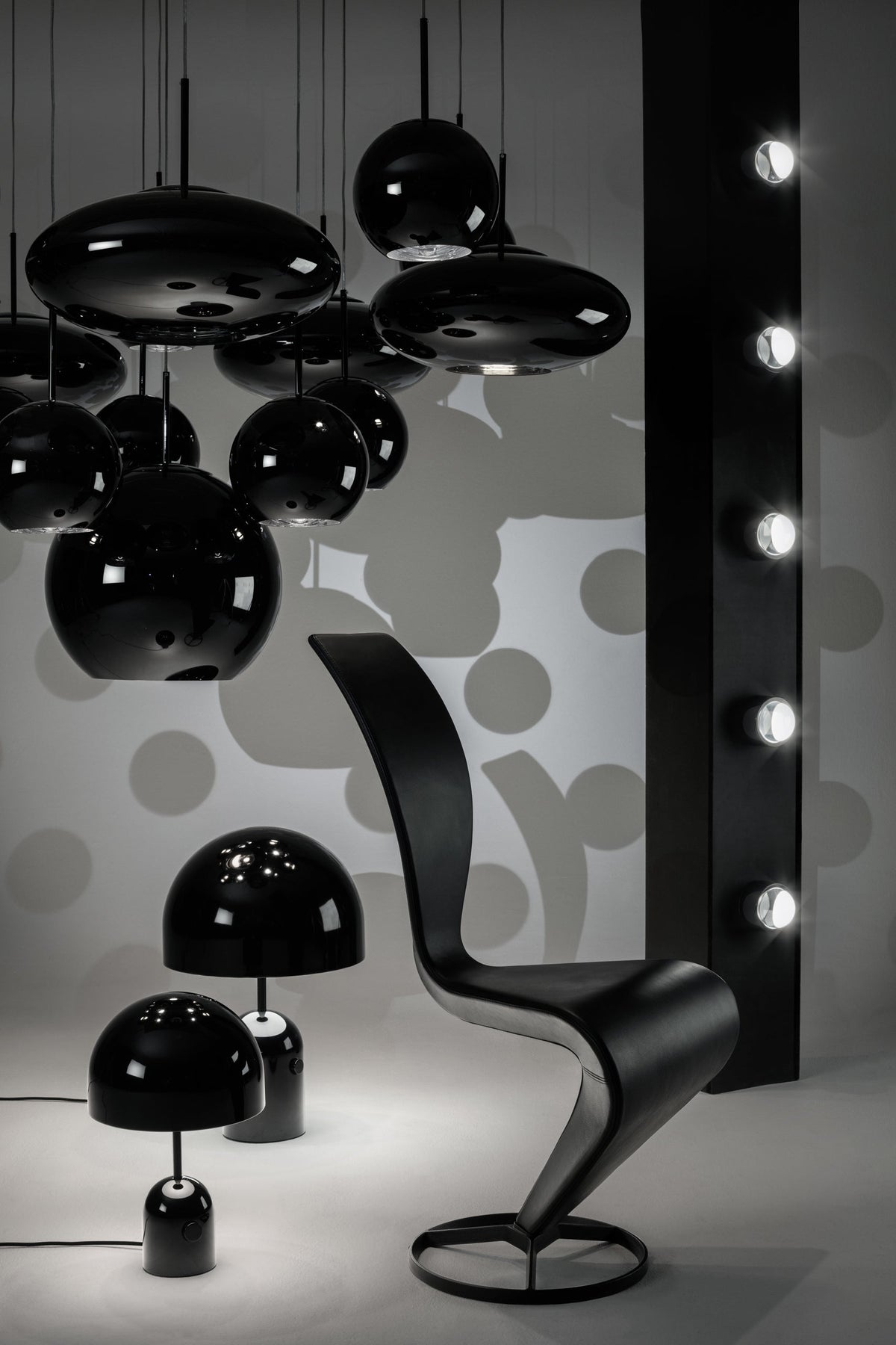 Tom Dixon Copper Black 45cm Pendant in a monochrome lighting display