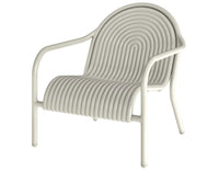 Tom Dixon Groove Outdoor Lounge Chair in a garden lifestyle setting