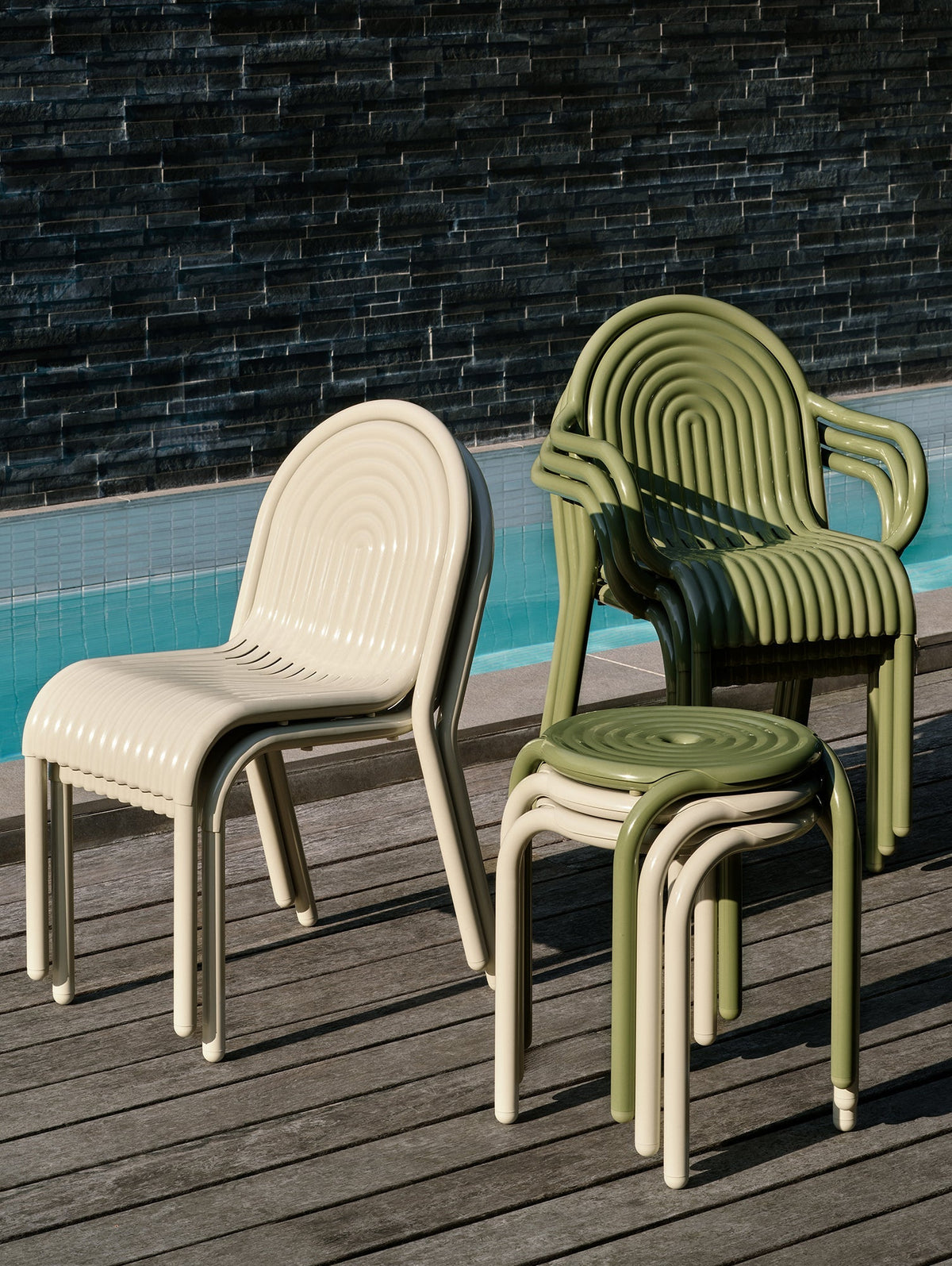 Tom Dixon Groove Outdoor Side Chair in an outdoor dining setting