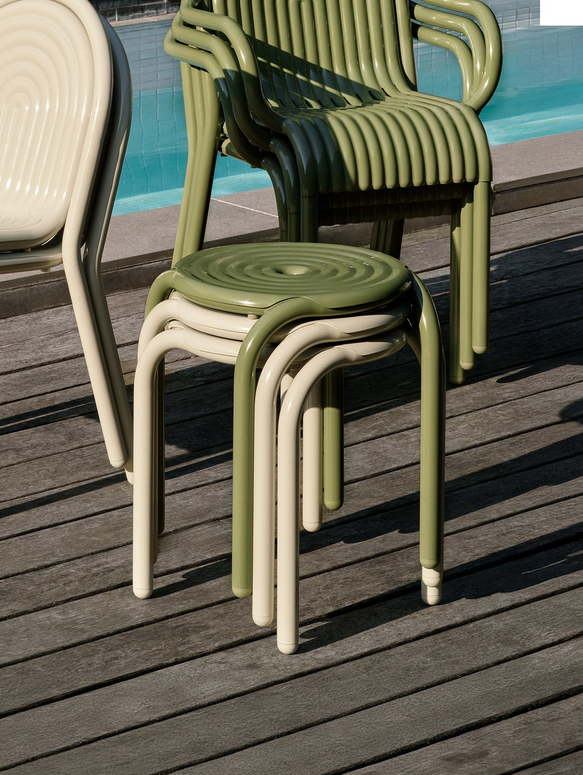 Tom Dixon Groove Outdoor Stool in an outdoor lifestyle setting