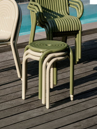 Tom Dixon Groove Outdoor Stool in an outdoor lifestyle setting