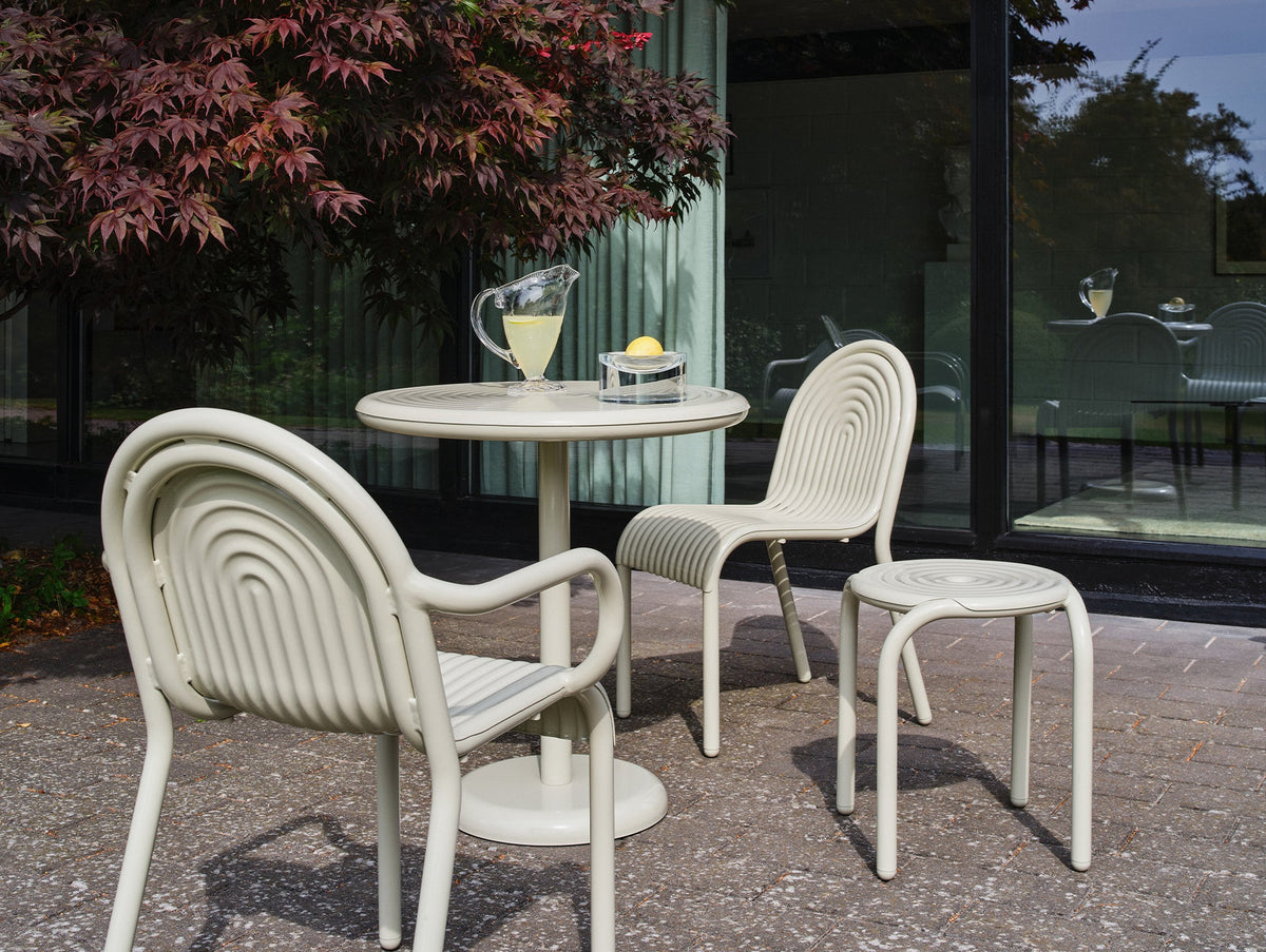 Tom Dixon Groove Outdoor Stool in an outdoor lifestyle setting