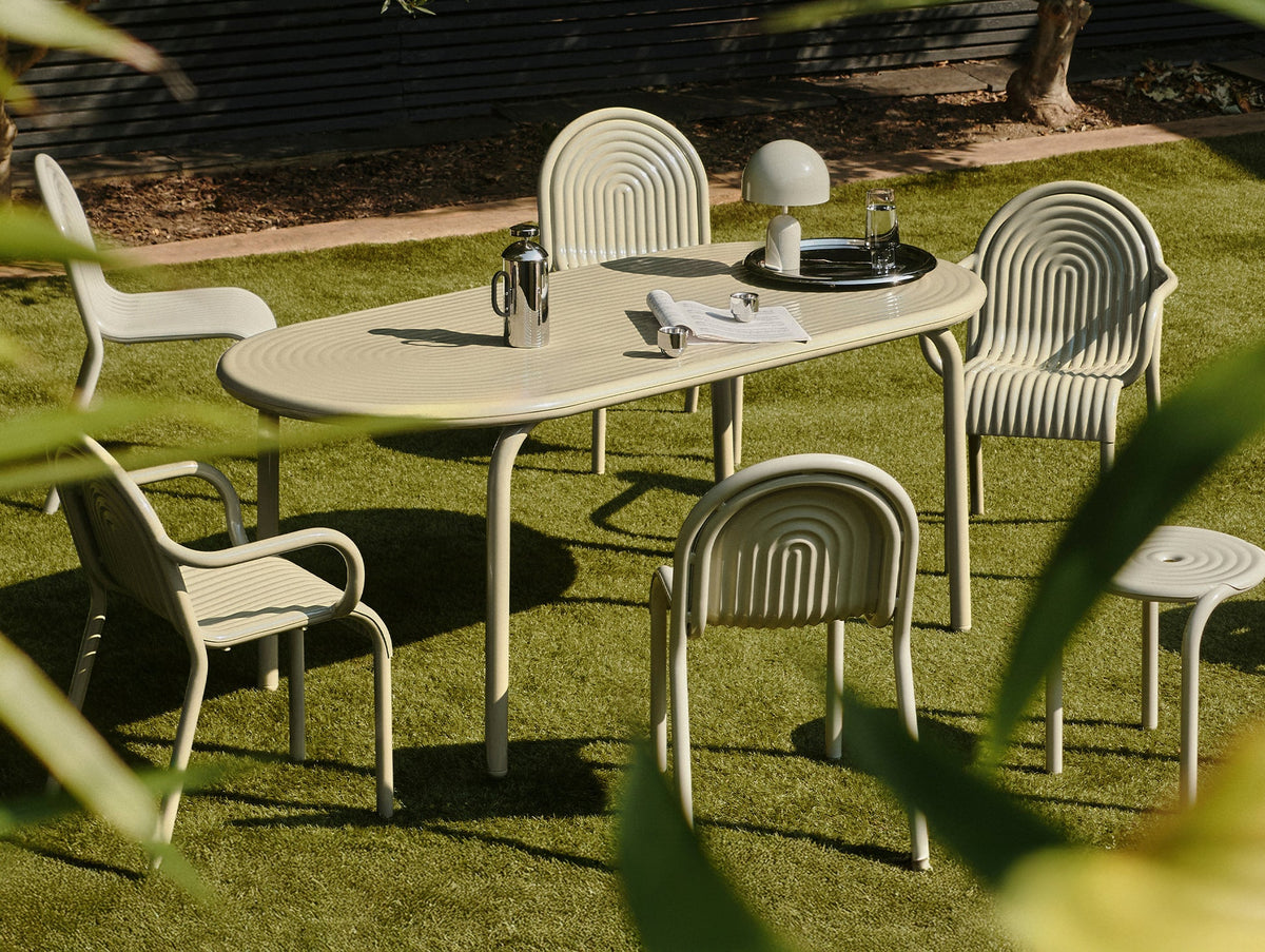Tom Dixon Groove Outdoor Stool in an outdoor lifestyle setting