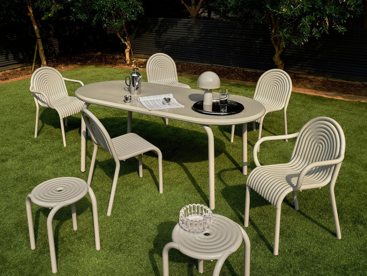 Tom Dixon Groove Outdoor Stool in an outdoor lifestyle setting
