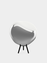 Melt Dichroic Large Portable Light by Tom Dixon in an outdoor setting