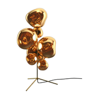 Melt Floor Chandelier in Gold Polished Polycarbonate by Tom Dixon