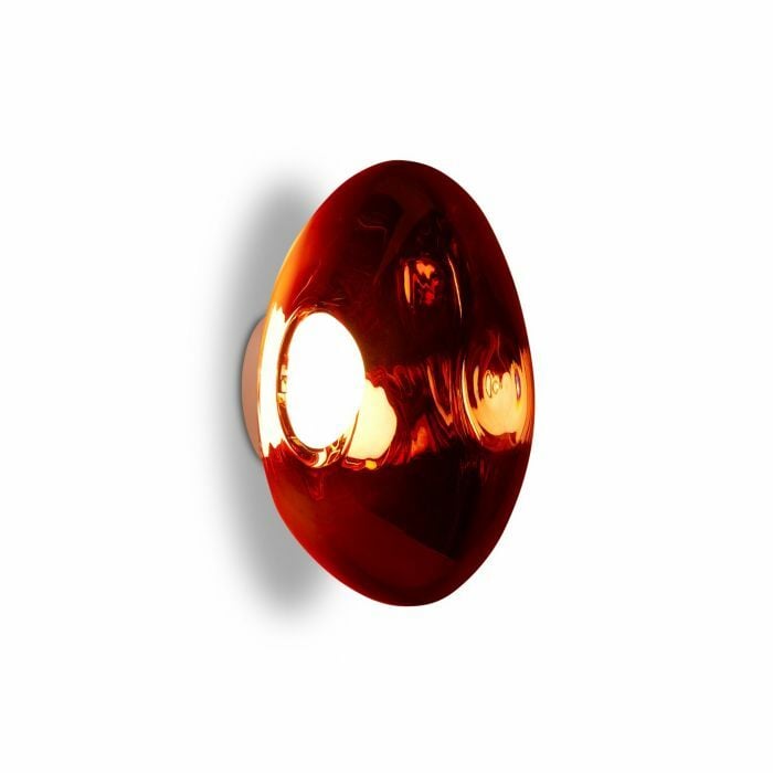 Tom Dixon Melt Medium Surface Light in polished copper, alternate angled illuminated view