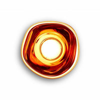 Tom Dixon Melt Medium Surface Light in polished copper, illuminated front view