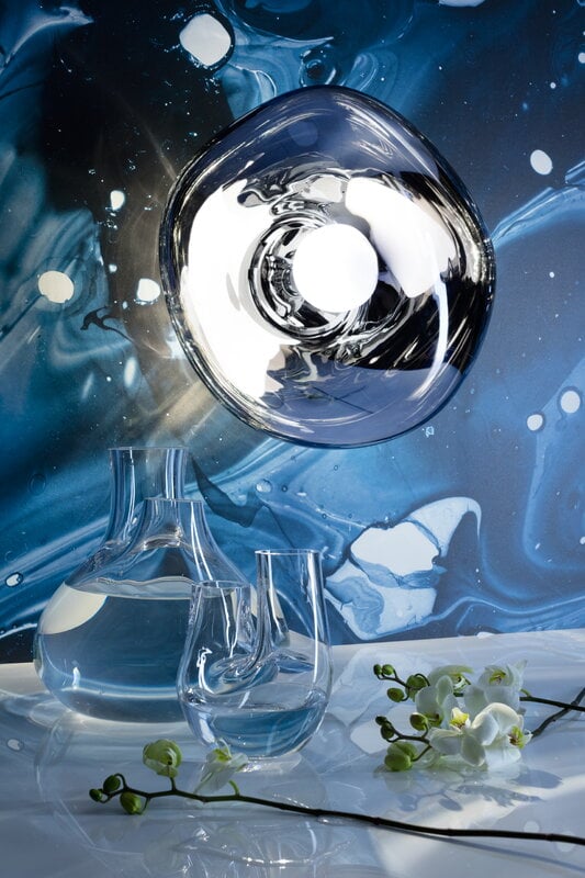 Tom Dixon Melt Medium Surface Light in smoke with plants in an interior installation