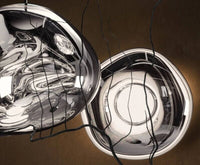 Tom Dixon Melt Medium Surface Light in smoke in a wall installation