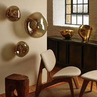 Tom Dixon Melt Medium Surface Light in bronze in a contemporary interior
