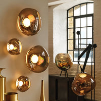 Tom Dixon Melt Medium Surface Light in bronze in an interior installation