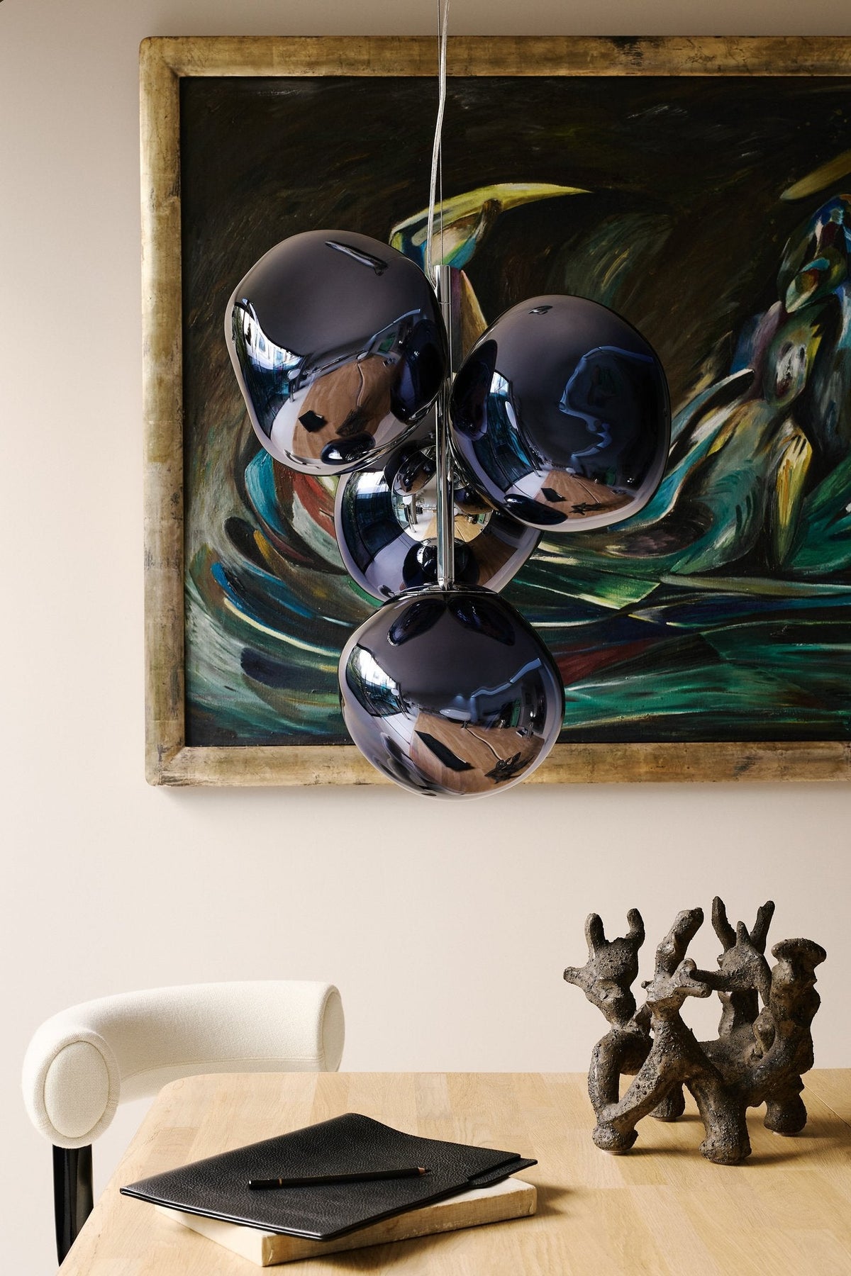 Tom Dixon Melt Mini Chandelier in smoke in a modern interior