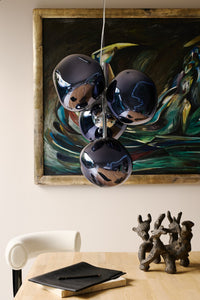 Tom Dixon Melt Mini Chandelier in smoke in a modern interior