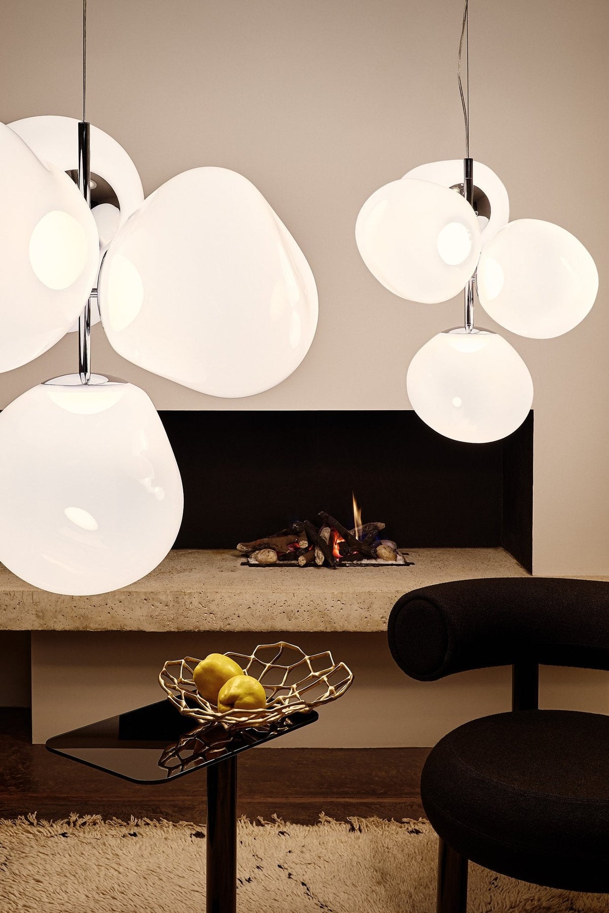 Tom Dixon Melt Small Chandelier in opal with silver hardware in an interior