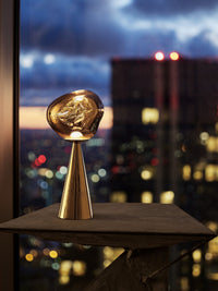 Melt Small Portable Light in Gold by Tom Dixon
