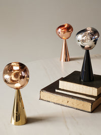 Melt Small Portable Light by Tom Dixon in an interior setting
