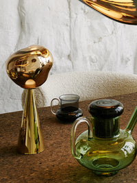 Melt Small Portable Light by Tom Dixon in an interior setting
