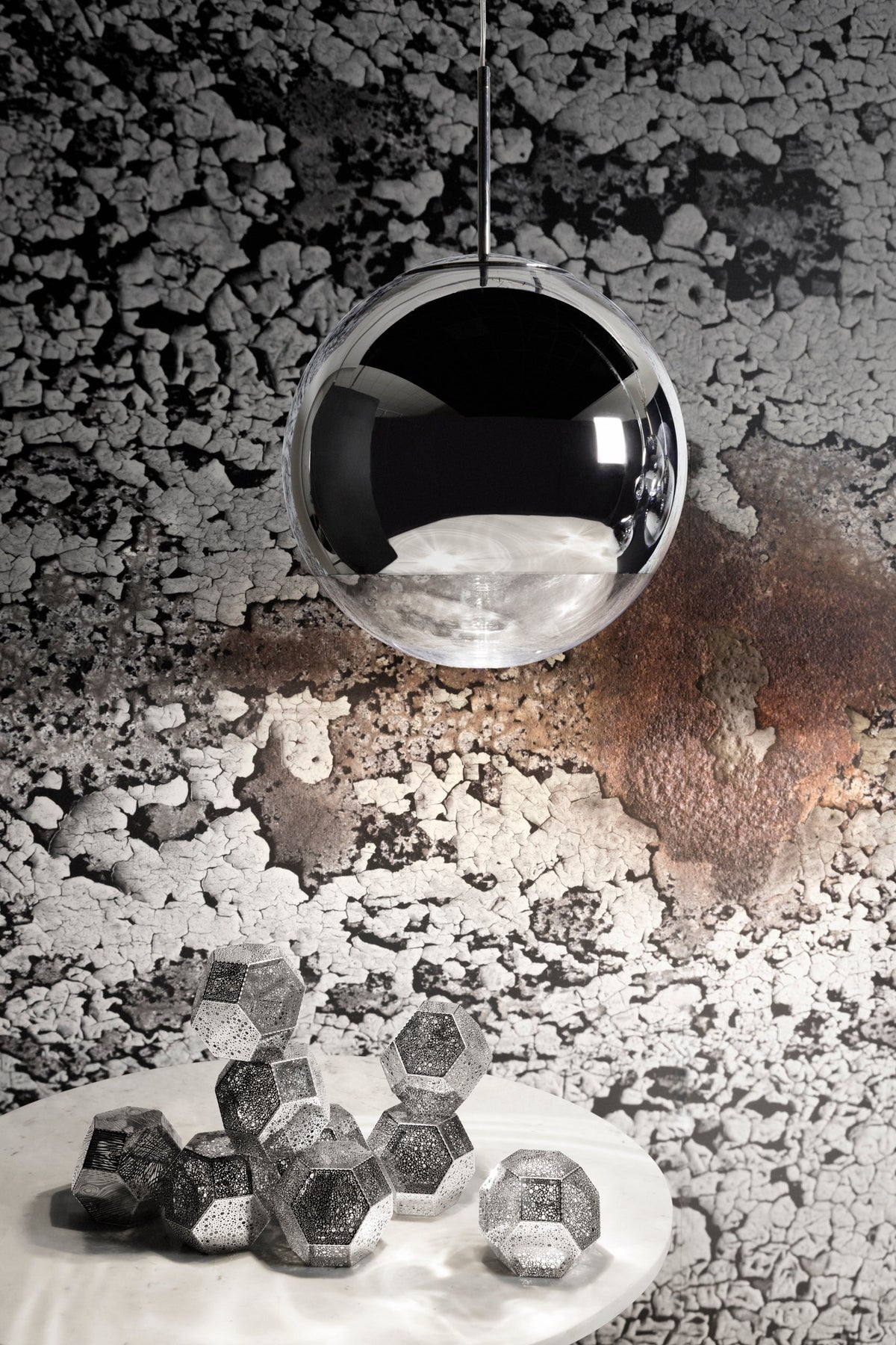 Tom Dixon Mirror Ball silver pendant in a modern interior setting