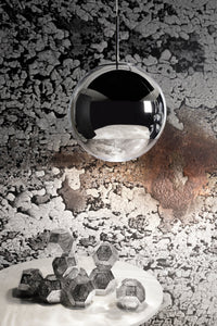 Tom Dixon Mirror Ball silver pendant in a modern interior setting