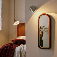 Tom Dixon Pose Surface Light in a modern interior