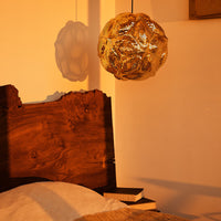 Tom Dixon Puff Pendant in a bedroom interior