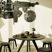 Tom Dixon Puff Pendant in a dining interior