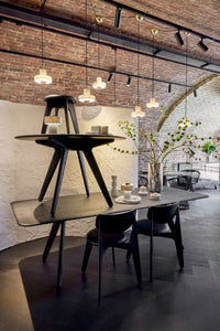 Tom Dixon Slab Large Round Table Black Brushed Oak in a modern interior