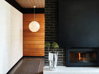 Tom Dixon Soft Medium Pendant in a modern room, illuminated