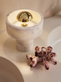 Stone Portable Light by Tom Dixon in an interior setting