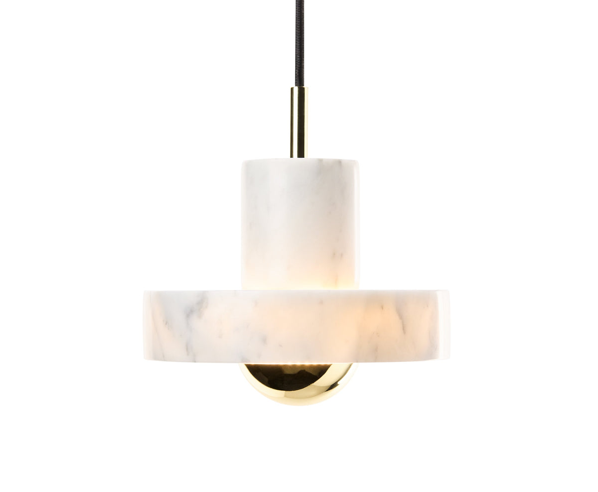 Tom Dixon Stone Small Pendant in gold and white marble, front view illuminated