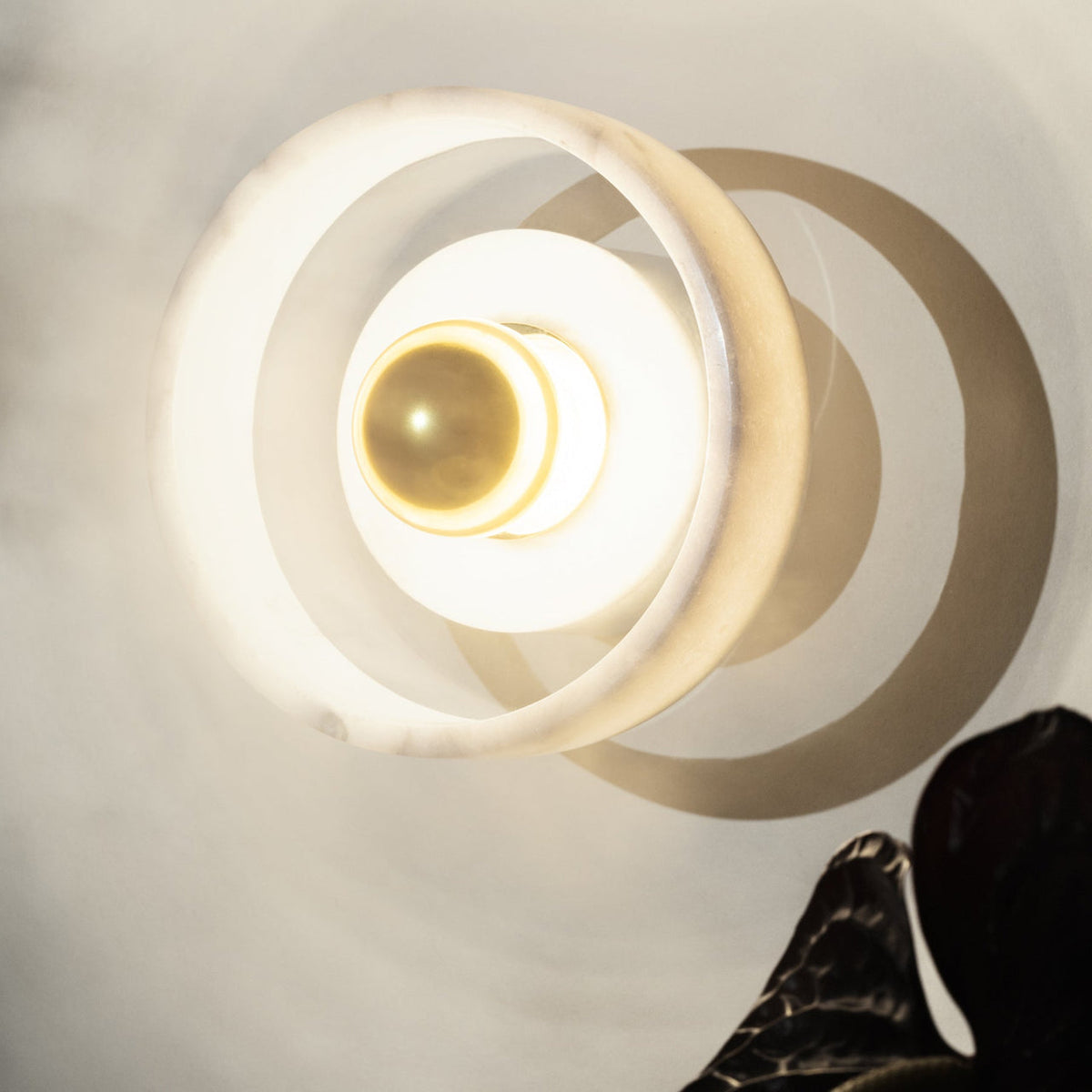 Tom Dixon Stone Wall Light in an interior installation