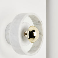 Tom Dixon Stone Wall Light in an official interior setting