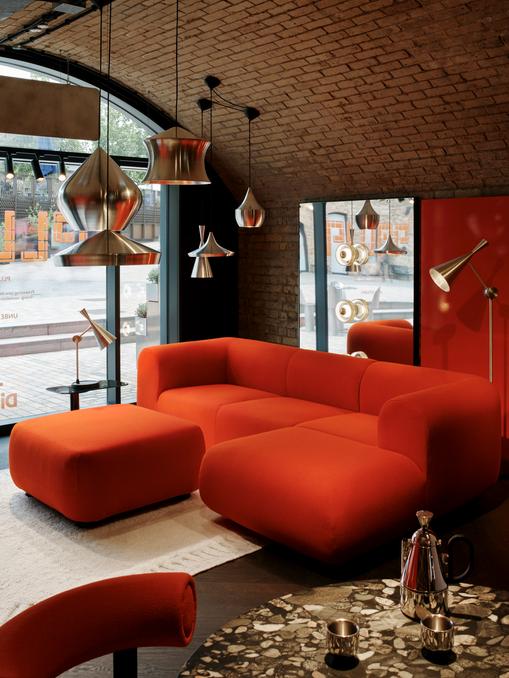 Tom Dixon Unbeaten pendants in a red modern living room