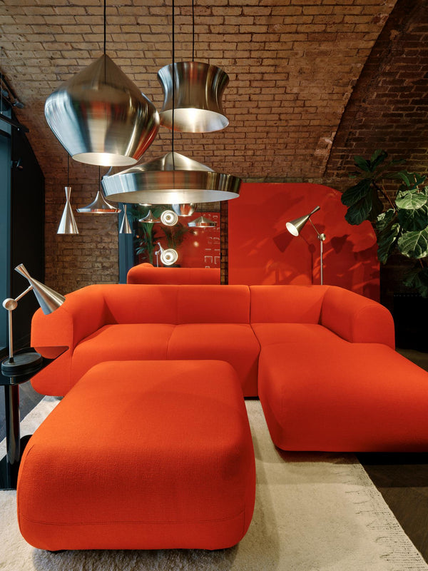 Tom Dixon Unbeaten Waist Pendant in a red modern interior