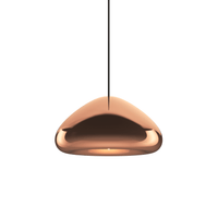 Tom Dixon Void Medium Pendant in polished copper, illuminated