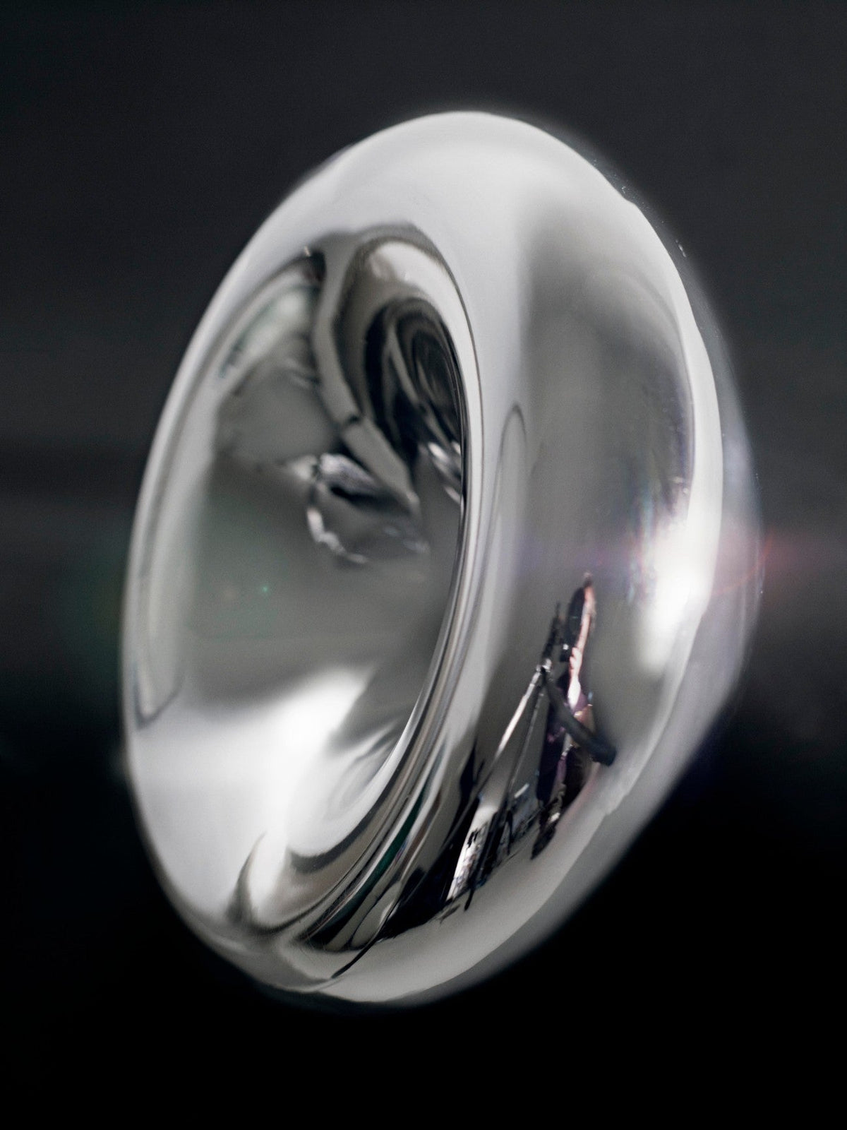 Tom Dixon Void polished steel pendant reflective surface detail