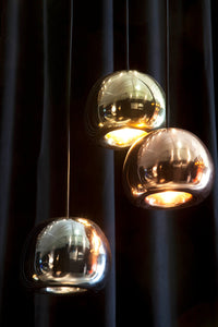 Tom Dixon Void Mini pendants in copper, brass, and steel finishes