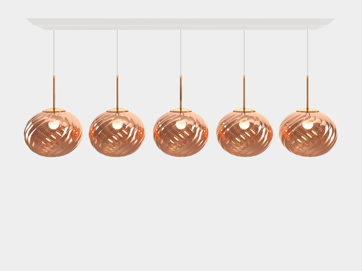 Tom Dixon Whirl copper linear pendant system illuminated