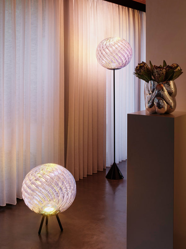 Whirl Dichroic Large Portable Light by Tom Dixon in an interior or outdoor setting