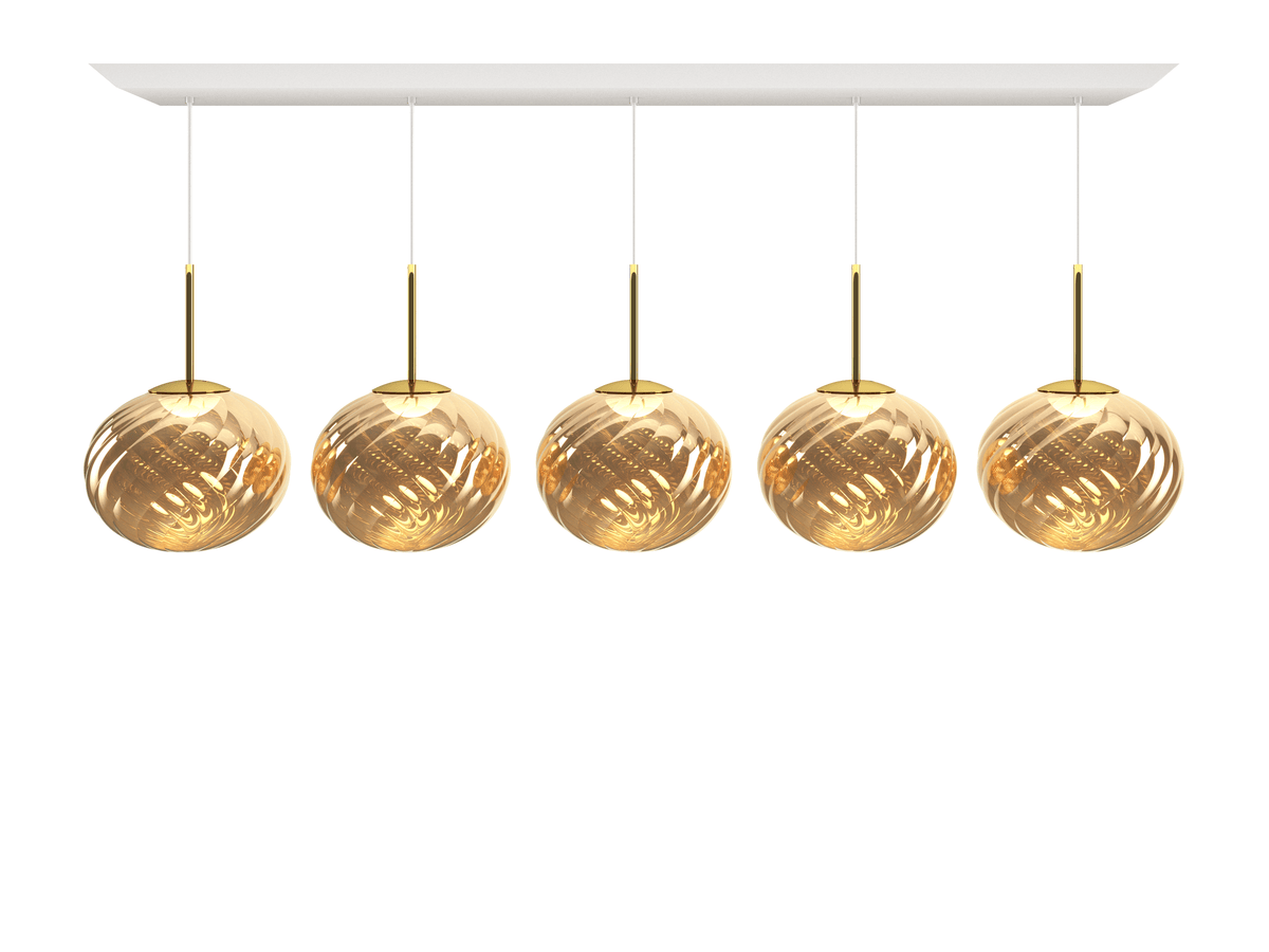 Tom Dixon Whirl Linear Pendant System in gold, illuminated