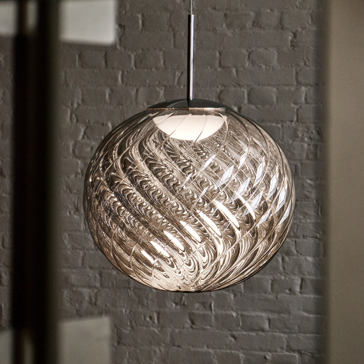 Tom Dixon Whirl lighting in an official room setting