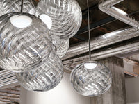 Tom Dixon Whirl silver pendant installation close-up